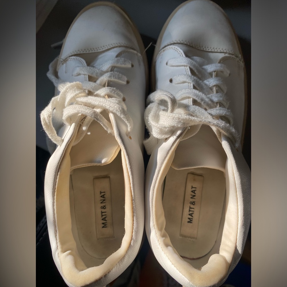 Yellow v on White sneakers